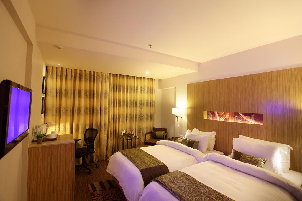 Comfort Inn Legacy Rajkot Phòng bức ảnh